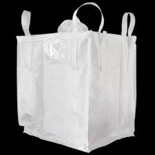 White FIBC bulk bag with cross-corner lift loops on a studio backdrop